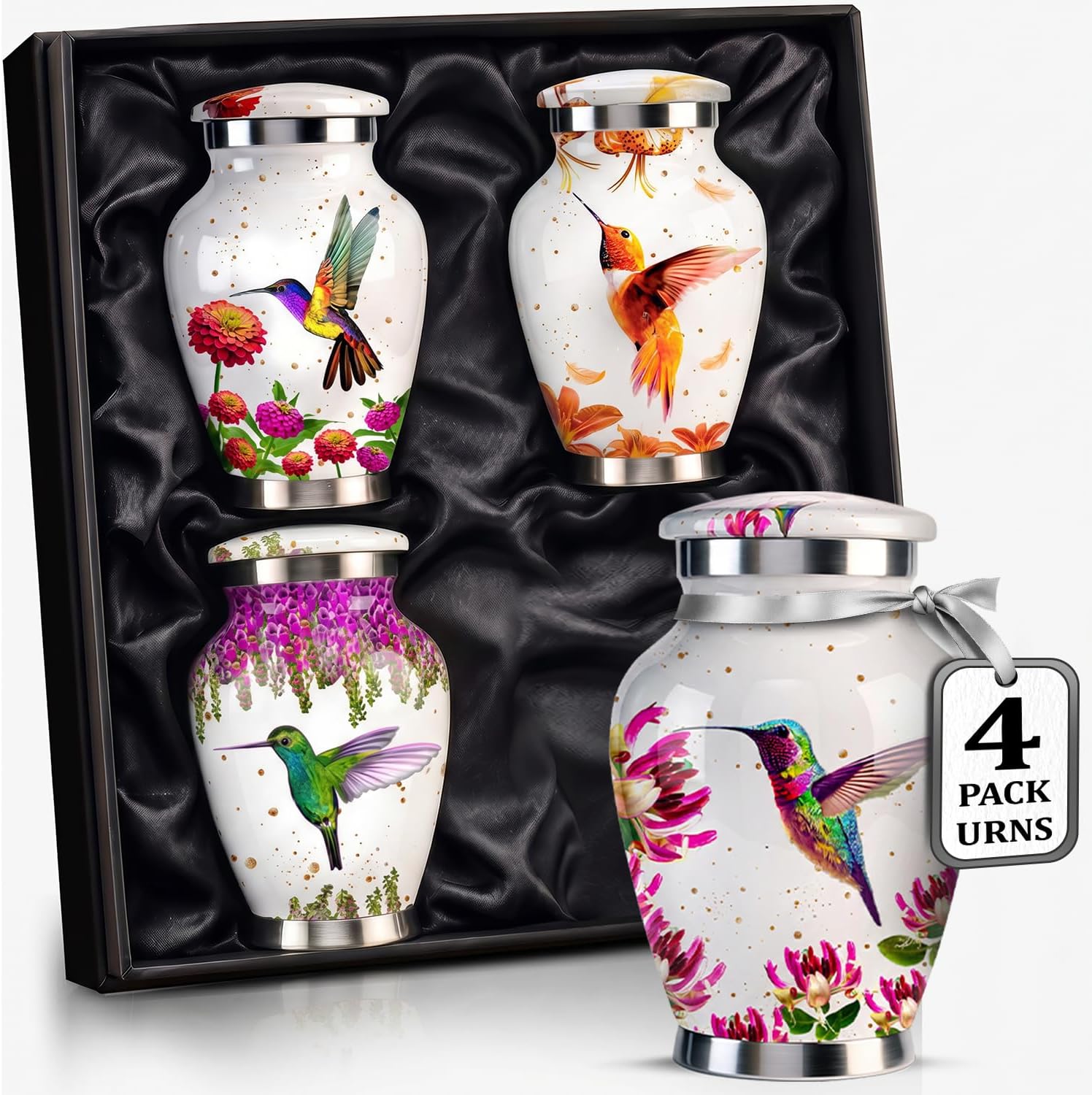 The complete white hummingbird keepsake set — four hand-painted keepsake urns with silver bands and velvet bags in a presentation box