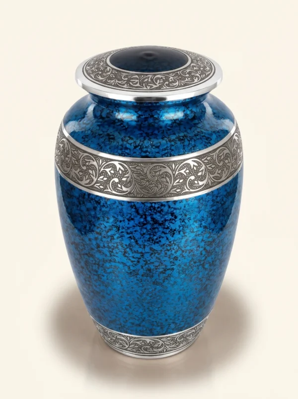 Blue cremation urn three-quarter angle showing lid and silver banding