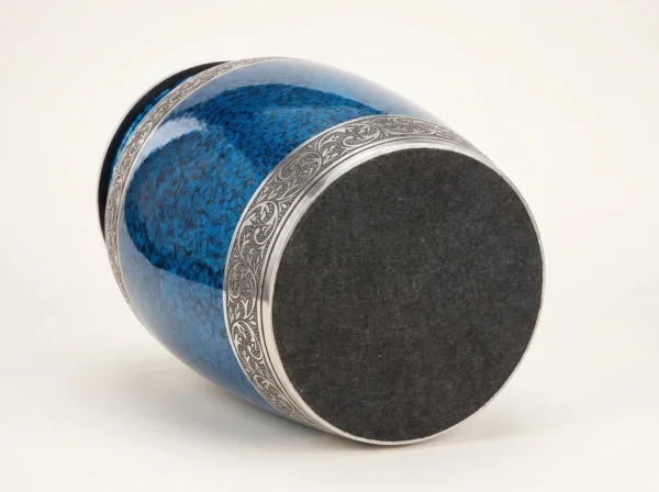Blue cremation urn base with protective charcoal felt bottom