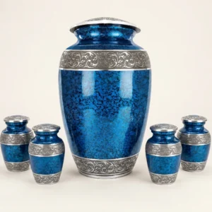 Blue cremation urn family set with four matching keepsakes and a necklace