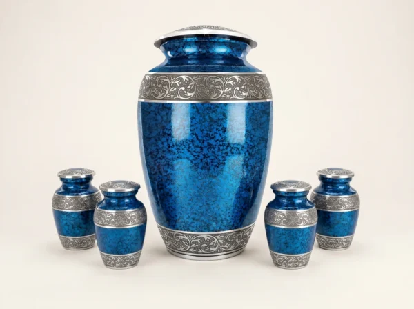 Blue cremation urn family set with four matching keepsakes and a necklace