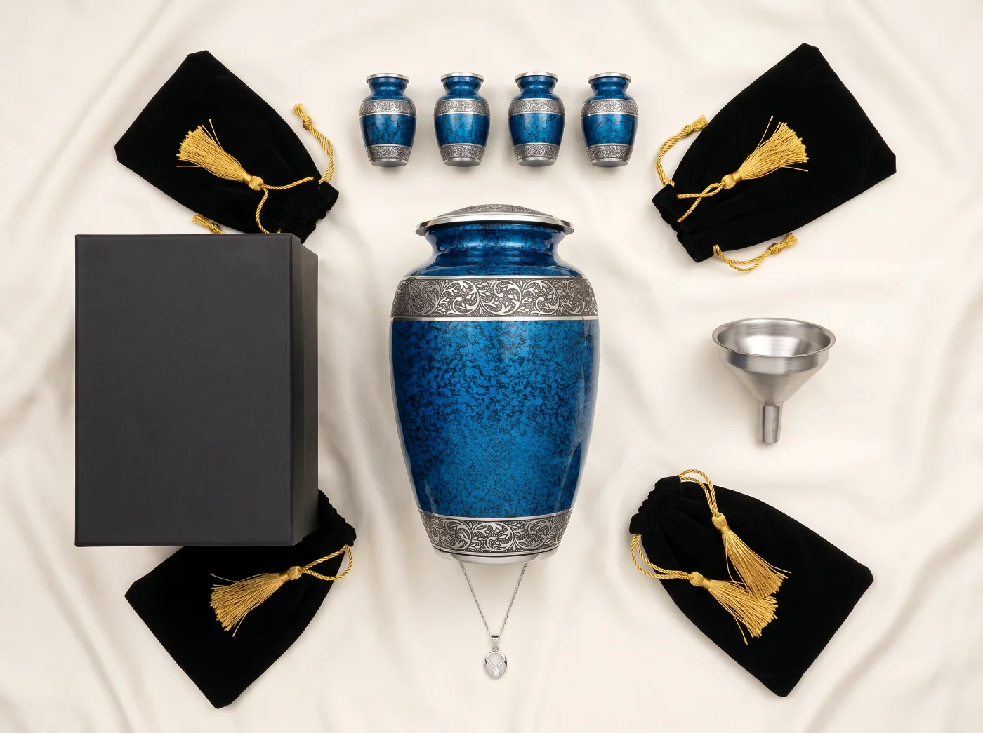 Everything included in the blue cremation urn family set