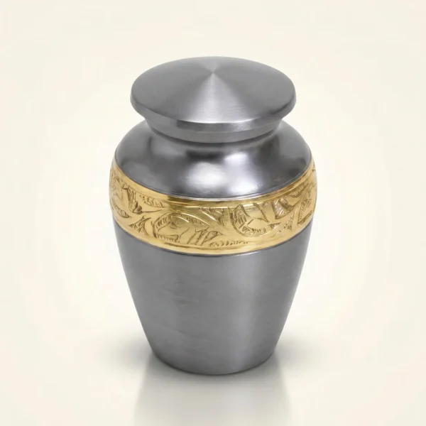 Pewter-grey keepsake urn three-quarter angle with gold engraved band