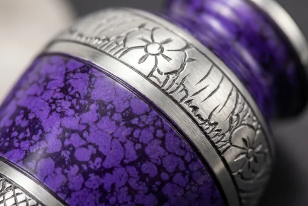 Close-up of the purple finish and silver engraved band