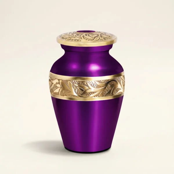 Purple metallic small keepsake urn with gold hand-engraved band, studio shot