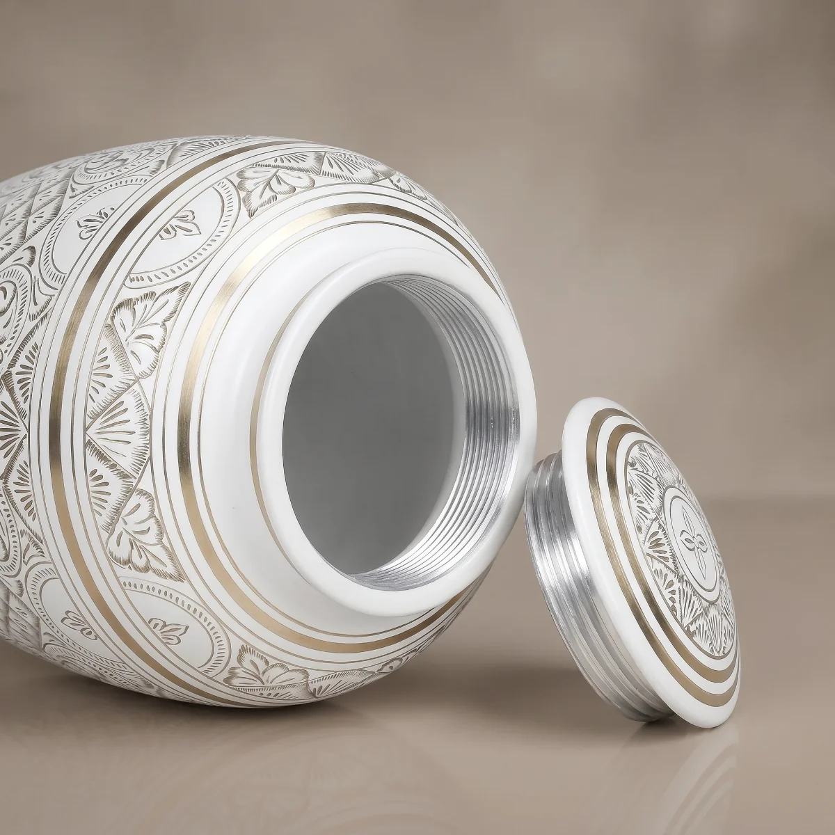 Secure silver screw-top lid shown unscrewed, thread inside the neck