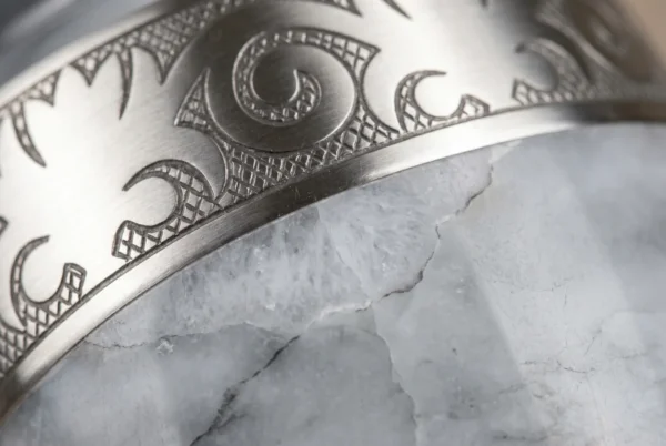 White Marble cremation urn close-up of silver band and marble