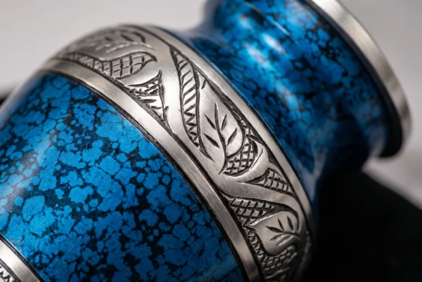 Close-up of the blue marble finish and silver engraved band