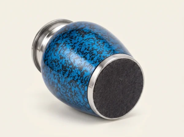 Base of a blue marble keepsake urn with a protective felt bottom