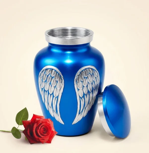 Blue angel wings keepsake urn with the lid off showing the silver threaded opening