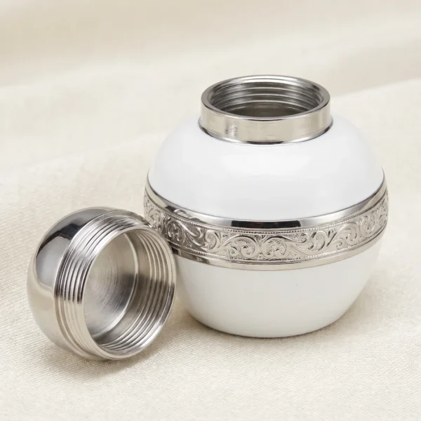 White enamel keepsake urn with the lid removed showing the silver threaded neck