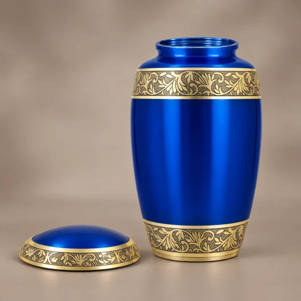Blue and gold metallic cremation urn with the threaded lid removed
