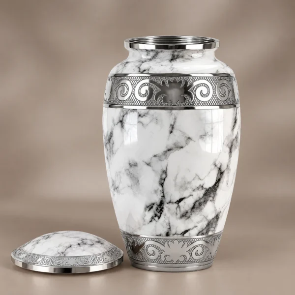 Off-white marble cremation urn with the threaded lid removed