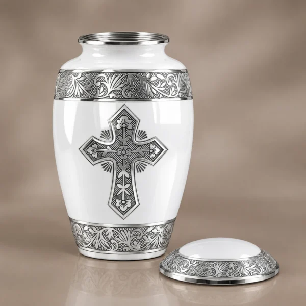 White cross cremation urn with the threaded lid removed